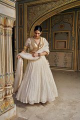 Ivory double border Golden Zari Mukesh Lehenga
