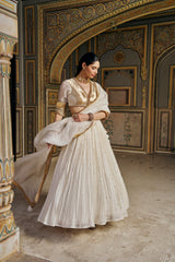 Ivory double border Golden Zari Mukesh Lehenga