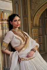 Ivory double border Golden Zari Mukesh Lehenga