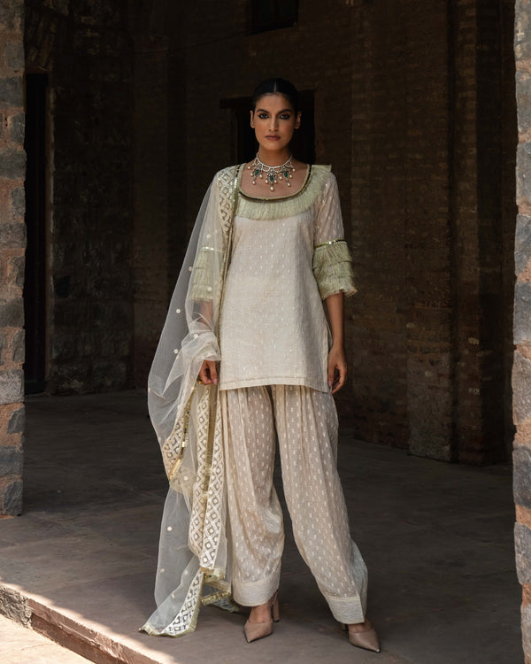 Off white fringe top with Farshi salwar