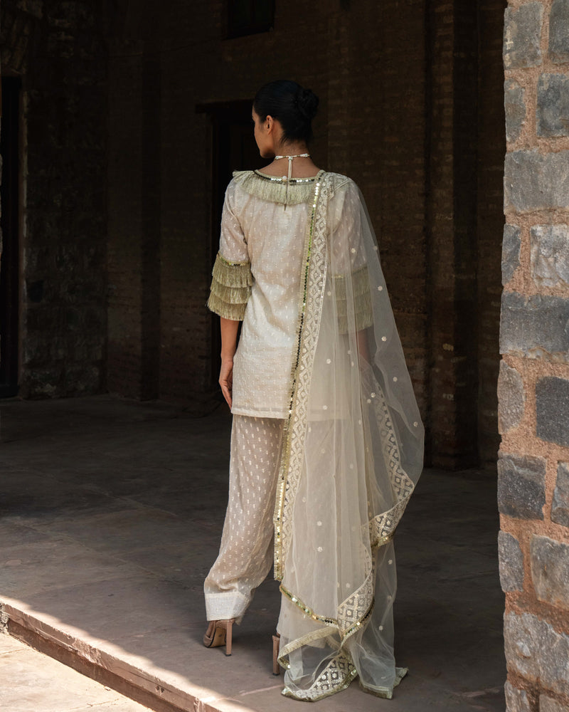 Off white fringe top with Farshi salwar