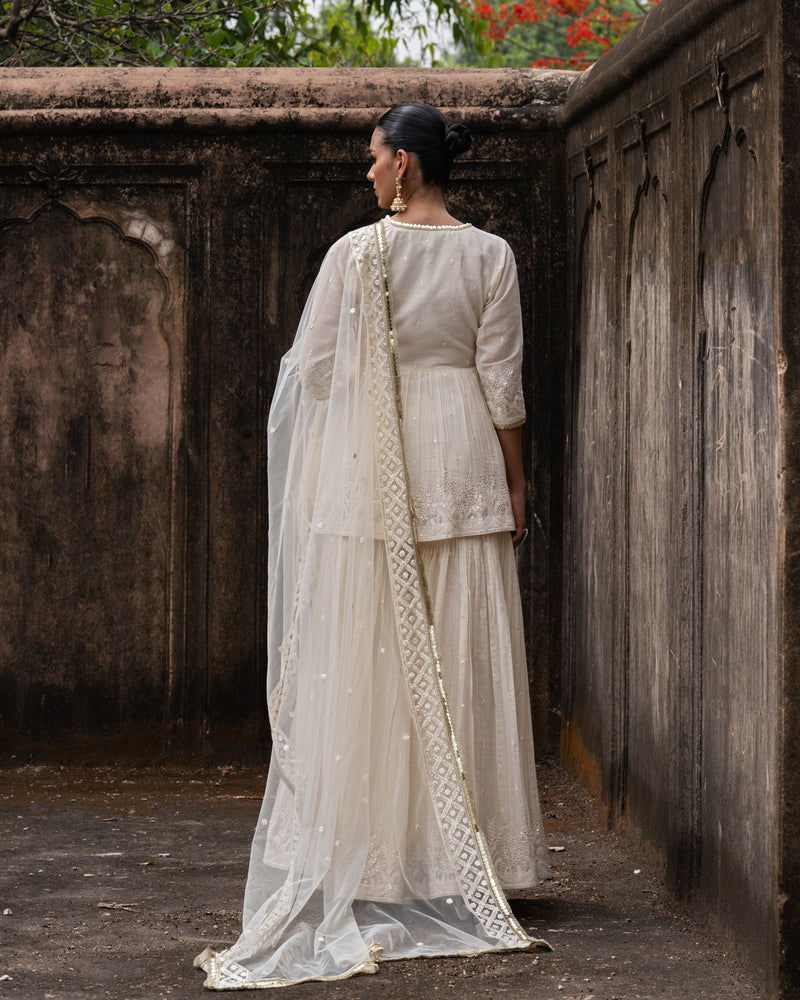 Off white golden Forest peplum sharara with emroidered dupatta