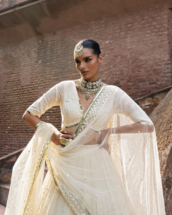 gold & off white big border Lehenga with Embroidered Dupatta