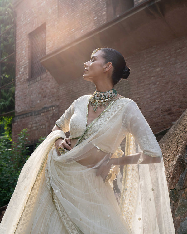 gold & off white big border Lehenga with Embroidered Dupatta