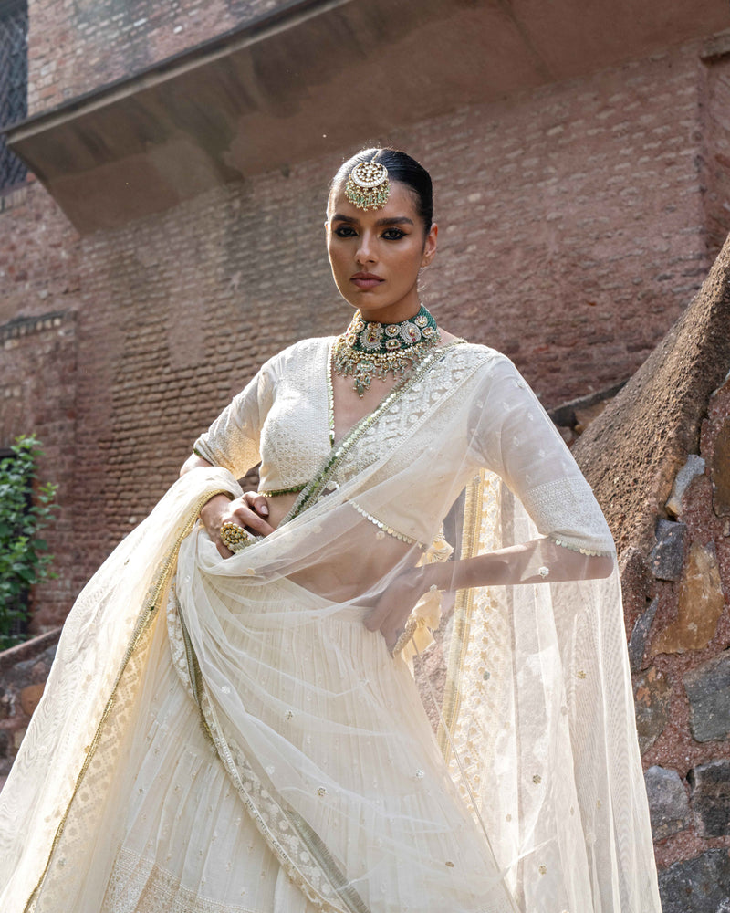 gold & off white big border Lehenga with Embroidered Dupatta