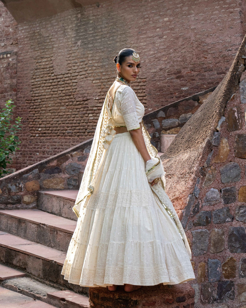 gold & off white big border Lehenga with Embroidered Dupatta