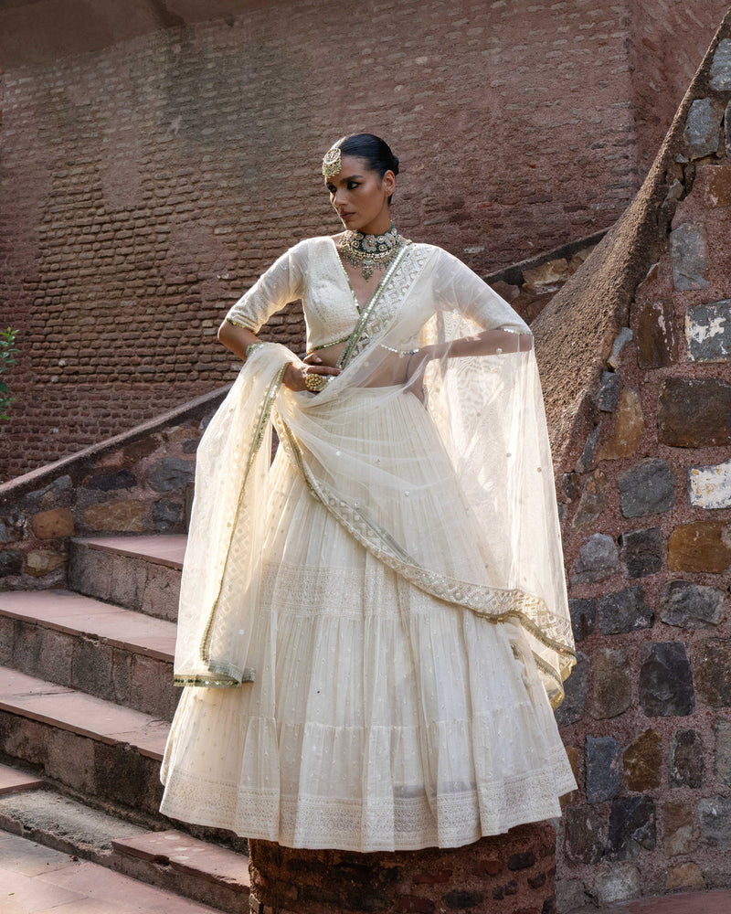 gold & off white big border Lehenga with Embroidered Dupatta
