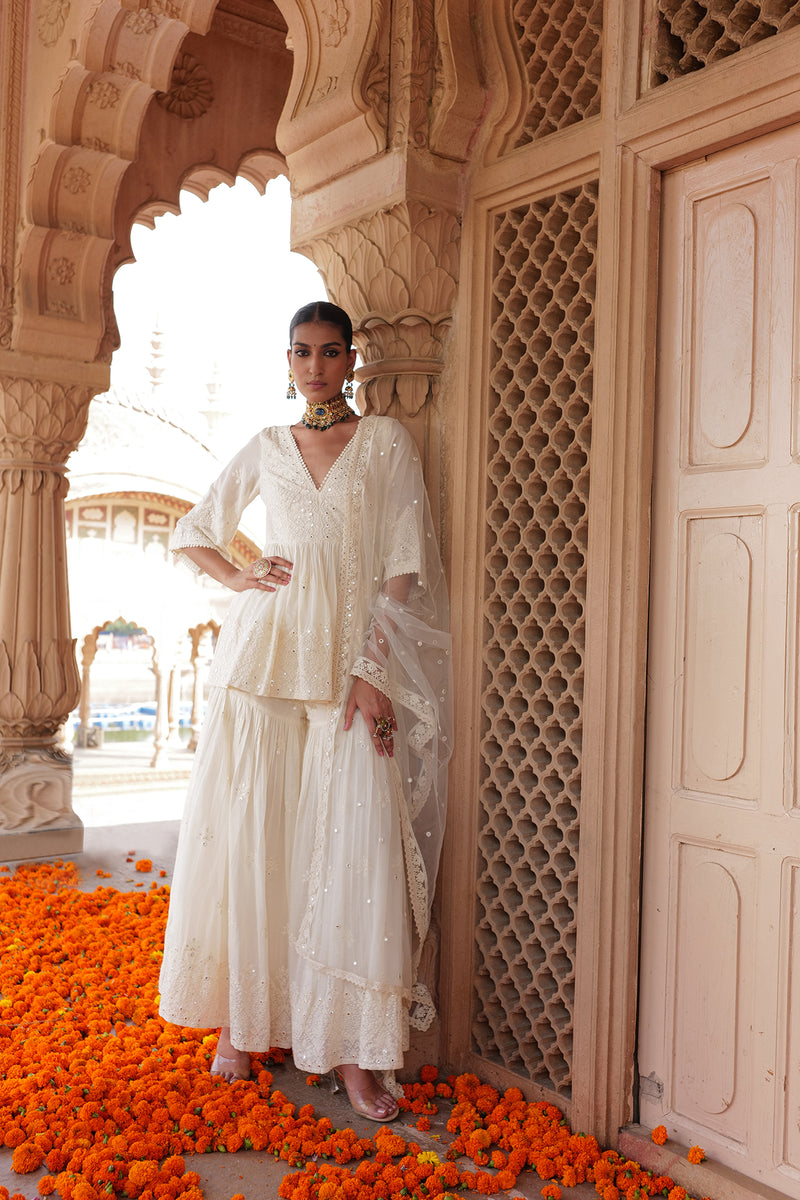 Off White all-over Ambi Embroidered Peplum Sharara with Dupatta