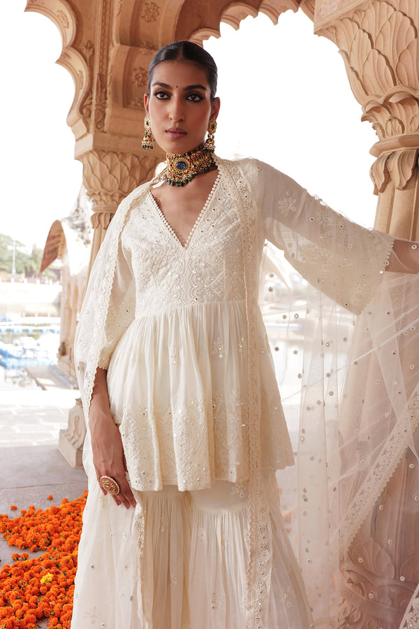 Off White all-over Ambi Embroidered Peplum Sharara with Dupatta